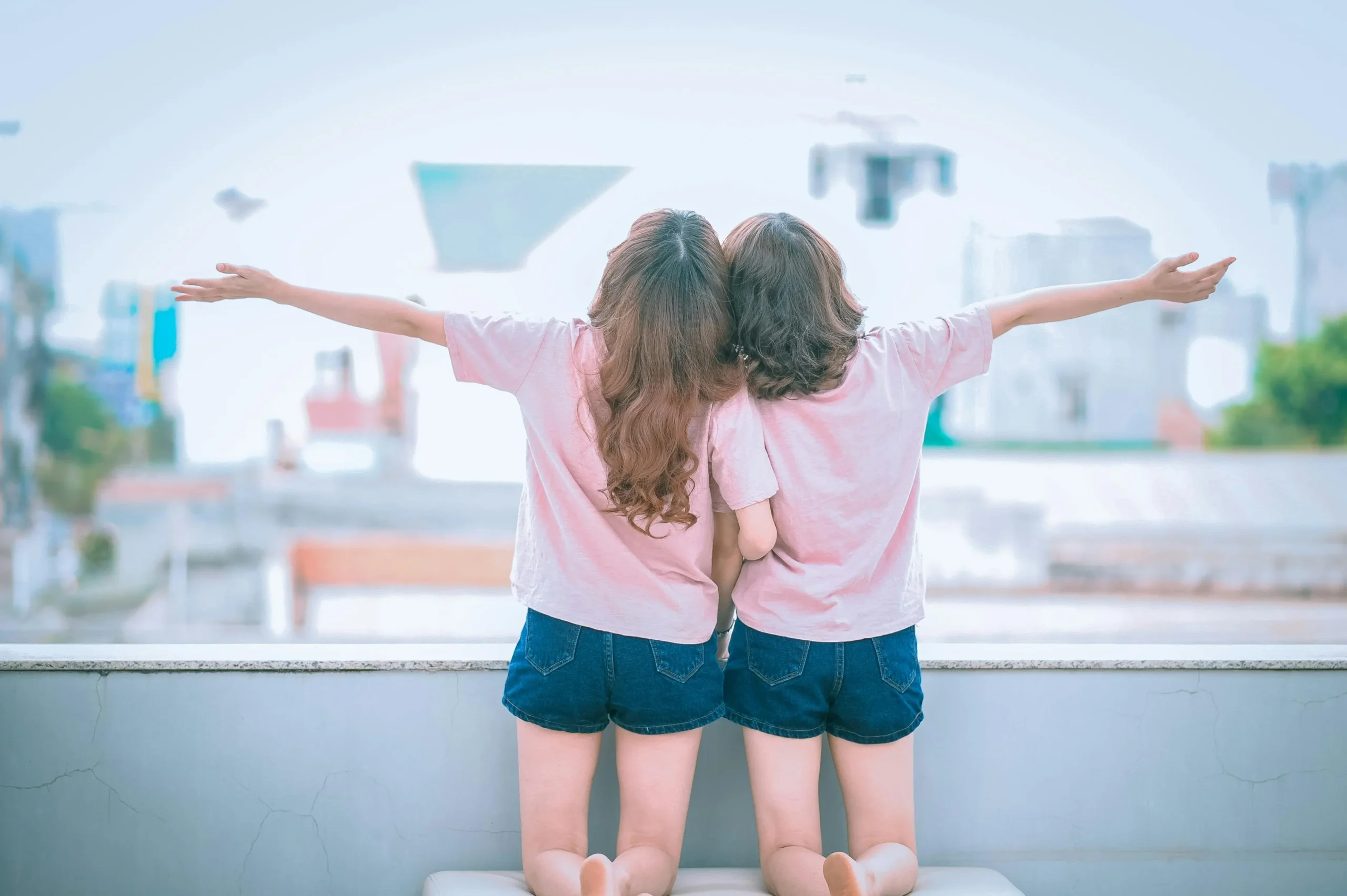 Two girls enjoying a clean room after a residential Baywatcher Cleaning in Tampa.
